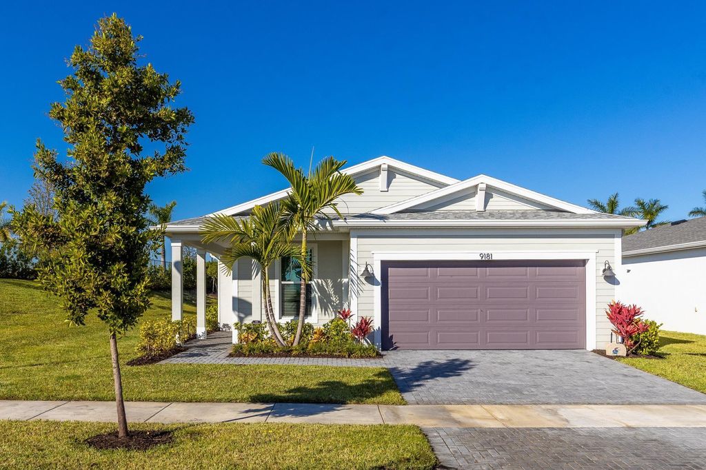 Photo of 9181 SW Remy Lane, Port Saint Lucie, FL 34987 (MLS # F10537967)