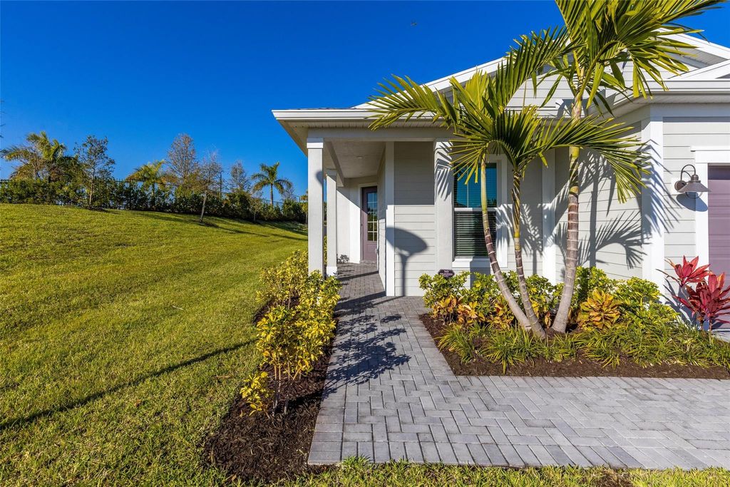 Photo of 9181 SW Remy Lane, Port Saint Lucie, FL 34987 (MLS # F10537967)