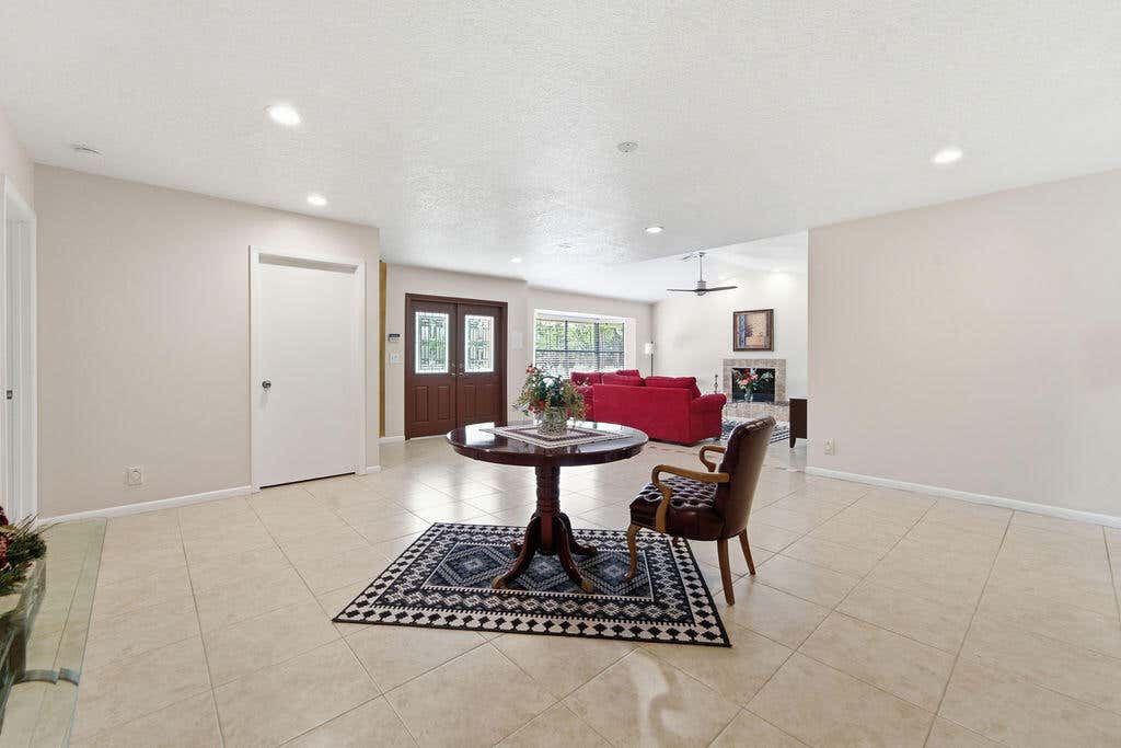 Photo of 5562 Reynolds Road, Lake Worth, FL 33449 (MLS # B26015486)