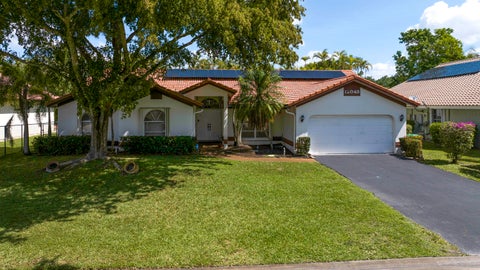 Photo of 12043 SW 1st Street, Coral Springs, FL 33071 (MLS # B26019948)
