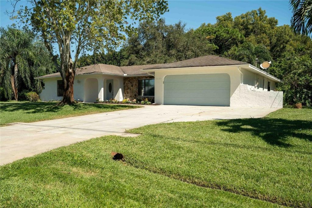 Photo of 2409 SE Delano Road, Port Saint Lucie, FL 34952 (MLS # F10405247)