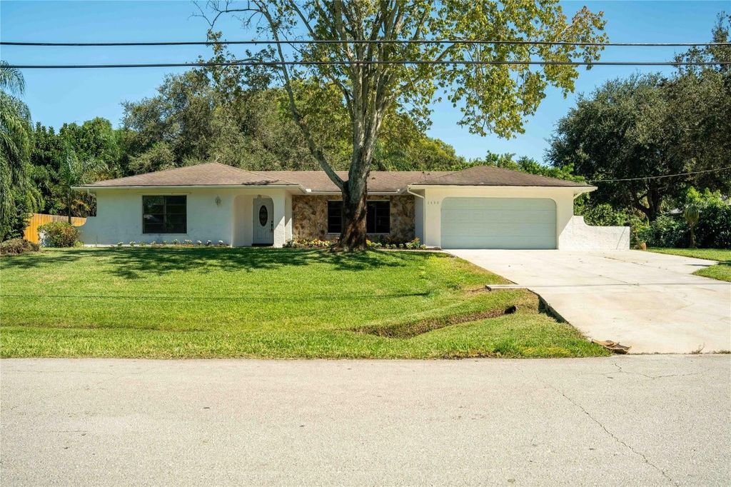 Photo of 2409 SE Delano Road, Port Saint Lucie, FL 34952 (MLS # F10405247)