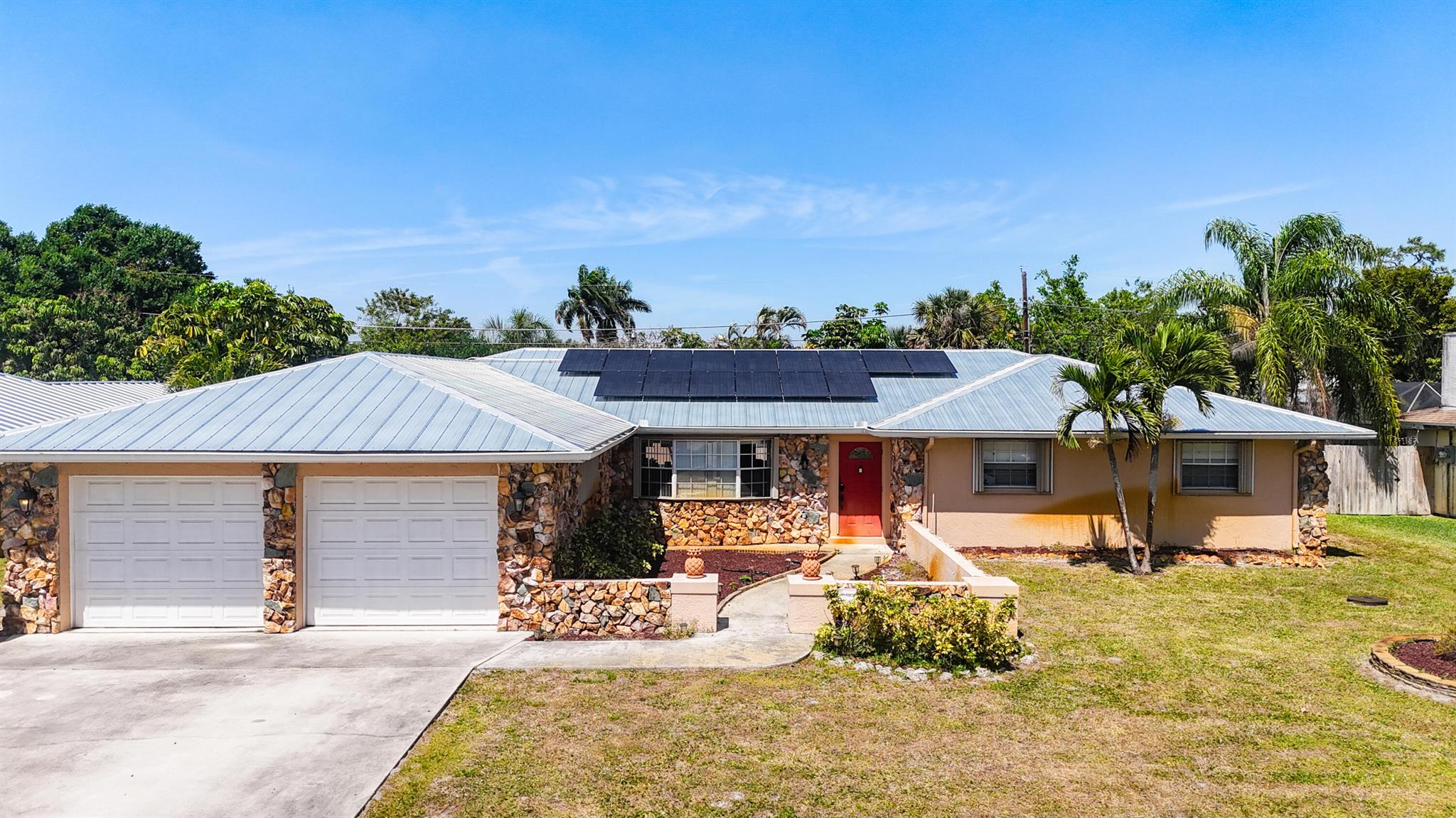 Energy-Efficient Oasis with Modern Upgrades - Now Offered at $500,000 (Buyer Assumes Solar Loan)Welcome to this beautifully updated 3-bedroom, 2.5-bathroom pool home in the desirable River Park neighborhood, featuring over 2,600 sq ft of living space on a 12,632 sq ft lot. This home blends modern comfort with sustainable living and no HOA restrictions.Energy Efficiency & Major Upgrades:New 2024 metal roof - built to last and hurricane-ratedAdvanced Home Power System - includes solar panels + whole-house Generac generator with LPG tankElectric bills average under $20/monthBuyer to assume existing GoodLeap loan (~$100,000, ~$300/mo) for solar + generator (no upfront cost)Accordion shutters - full storm protection