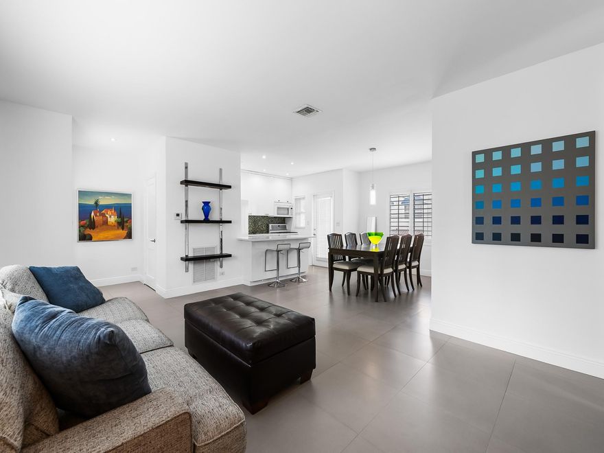 Updated Oasis In East Fort Lauderdale's subdivision of Victoria Park. Situated behind lush tropical landscaping is Victoria Park Garden a boutique condominium complex. Tastefully modernized to today's contemporary lifestyle. The bright open floor plan allows for open concept living. The kitchen with newer appliances and a gas range offers a snack bar and over looks the dining area & great room.  The luminous primary bedroom has no shared walls on the north and west side & offers a custom closet system. The guest bedroom and closet is generous in size and both bedrooms share a fully updated bathroom. This unit offers a washer and dryer in the unit. A short distance to Holiday Park, pickle ball courts, tennis courts, the beach, shopping, restaurants and fitness centers. Sq. Ft. from BCPA.