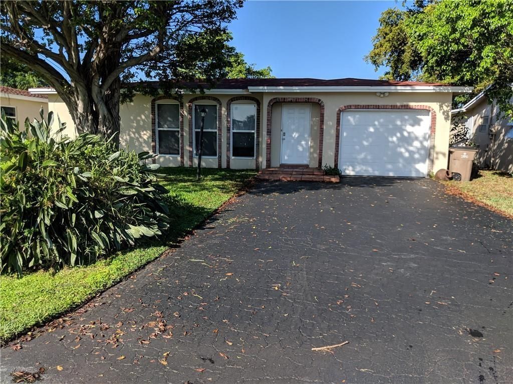 Photo of 4831 NW 18th Avenue, Deerfield Beach, FL 33064 (MLS # F10497095)