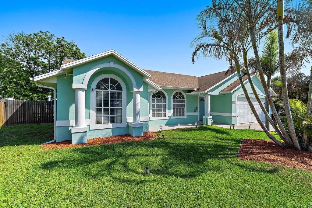 Photo of 921 NE Zebrina Senda, Jensen Beach, FL 34957 (MLS # B26007492)