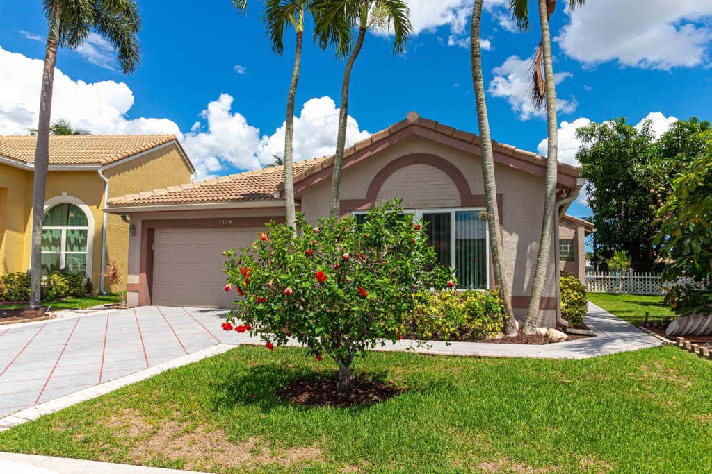 Photo of 7130 Michigan Isle Road, Lake Worth, FL 33467 (MLS # B26032818)