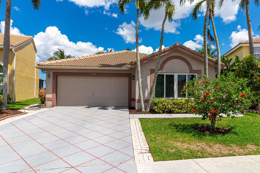 Photo of 7130 Michigan Isle Road, Lake Worth, FL 33467 (MLS # B26032818)