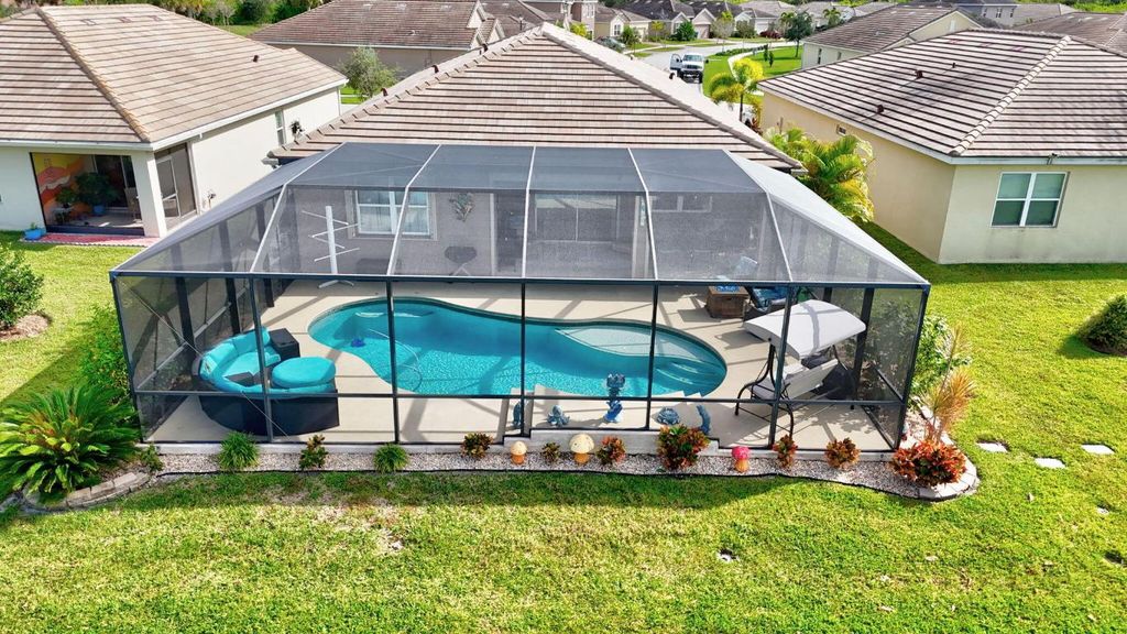 Photo of 12305 SW Arabella Drive, Port Saint Lucie, FL 34987 (MLS # R11133602)