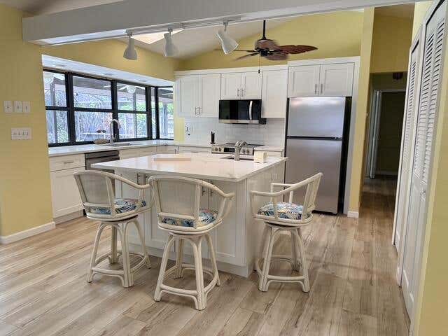 Photo of 5306 SE ORANGE Street, Stuart, FL 34997 (MLS # B26057839)