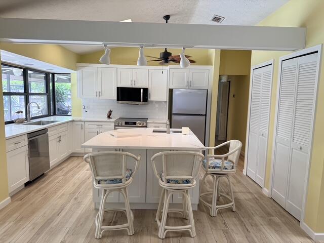 Photo of 5306 SE ORANGE Street, Stuart, FL 34997 (MLS # B26057839)