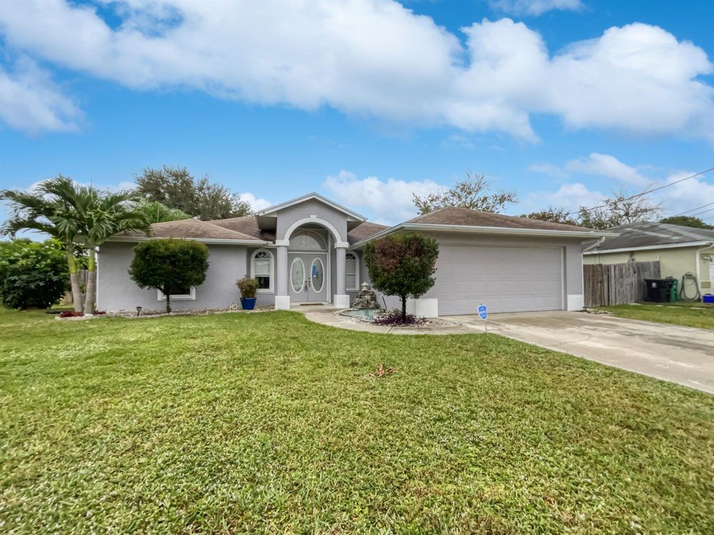 Photo of 2442 SW Dalpina Road, Port Saint Lucie, FL 34953 (MLS # R10943545)