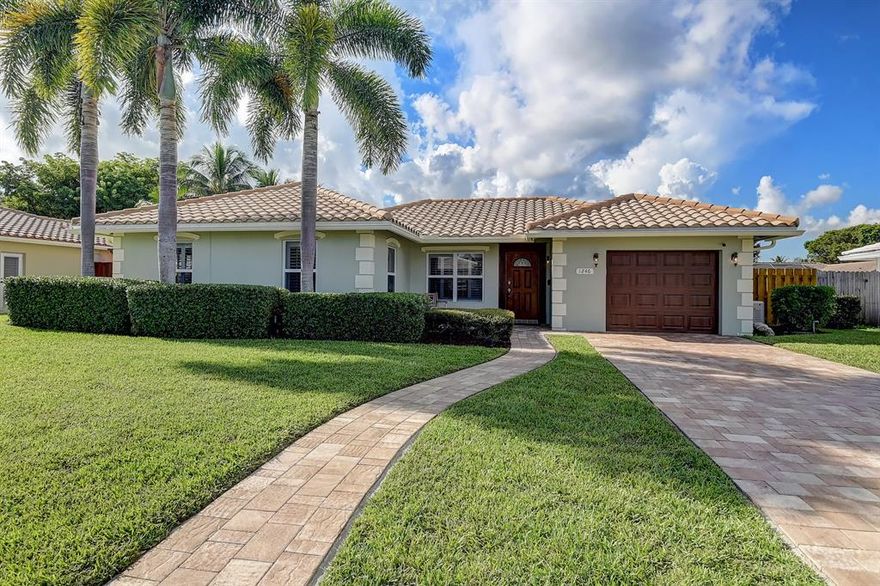 Pride of ownership is apparent in this immaculate Boca Square home! Located on one of the quietest streets in the community, this 3 bedroom, 2 bathroom pool home is move-in ready. Enjoy an open layout with room to entertain. Upgrades include full house generator, new flat roof, interior laundry room, wood look tile, custom built-ins, plantation shutters, and almost all hurricane impact windows. Enjoy South Florida living in the beautiful backyard with covered living space, paver pool deck, cabana bath and fully fenced in yard with no overhead powerlines. 
The garage has been partially converted into an office/play space. Close to great A+ schools, shopping, beach, more.