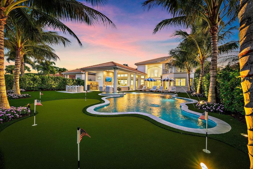 Completely reimagined and meticulously renovated in the sought after Jupiter Country Club, 179 Carmela Ct. is the epitome of timeless elegance and modern sophistication. This 4 bedroom, 4 ½ bath residence with a 3 car garage is perfectly positioned to capture breathtaking water and golf course views, overlooking the signature par-5 16th hole. Every detail of this home has been thoughtfully curated to create an inviting, yet luxurious atmosphere.
At the heart of the home, the custom-designed chef's kitchen showcases a premium Fulgor Milano and Sub-Zero appliance package, anchored by a 48-inch professional gas range with dual ovens and white enamel door fronts. Additional features include dual Sub-Zero/Cove dishwashers, built-in refrigerator and freezer columns, wall oven, microwave, warming drawer, Marvel wine refrigerator with ice maker, and two refrigerated beverage drawers. Dramatic 2½-inch mitered-edge quartz countertops, a full-height backsplash, pot filler, and custom vent hood complete this exceptional culinary space.
Designed for seamless entertaining, the kitchen flows effortlessly into the surrounding living areas, where a vent-free gas fireplace anchors the living room and creates a refined focal point. A conveniently positioned bar enhances service to both the living and dining spaces, while the formal dining room is generously scaled to accommodate large gatherings and elegant dinner parties with ease.
The primary suite offers a spa-inspired retreat appointed with marble and large-format tile, Rohl polished nickel fixtures, dual shower heads within an oversized glass enclosure, quartz countertops, Toto fixtures, and a Fleurco soaking tub.
Upstairs, a beautifully appointed junior primary suite features a private balcony, expansive walk-in closet, and a refined en-suite bath. An additional oversized bedroom with its own sitting area provides flexible space for a lounge, office, or private sanctuary. Secondary baths are elegantly finished with marble and tile surfaces, custom vanities, quartz counters, polished nickel fixtures, and Toto plumbing fixtures.
The resort-style backyard is a true showpiece. The completely reimagined pool, infinity edge spa, and water features showcase a Pebble Tec finish with glass tile detailing and all-new 2024 equipment, including a saltwater system, heater, pump, and lighting. Expansive lounging areas, professionally designed landscaping, and architectural lighting create a stunning evening ambiance. A Lynx built-in BBQ, outdoor refrigerator, gas line for a fire feature, Phantom screens, low-maintenance turf, and a custom-designed putting green complete this exceptional outdoor retreat.
Additional enhancements include three newer HVAC systems (2022-2024), a Halo whole-house water filtration and conditioning system, Icynene insulation, new flooring throughout, crown molding, a boxed beam ceiling in the family room, designer lighting, and plantation shuttersculminating in an impeccably upgraded luxury residence where no detail has been overlooked.
Jupiter Country Club is an exclusive gated community offering an exceptional lifestyle with modern amenities, including a Greg Norman 18-hole signature golf course, two resort-style pools, a full-service restaurant with indoor/outdoor dining, bar area and large fire pit for gathering with friends. The state-of-the-art fitness center features Technogym equipment, Pilates reformer, yoga, barre, and group fitness classes. Residents also enjoy spa services, tennis, bocce ball, pickleball, and basketball. Members benefit from reciprocal privileges at Invited Clubs worldwide. This home currently has an Intermediate/Associate Membership available upon closing. Minimum social membership required and Full Golf upgrade available - See membership details under Documents.