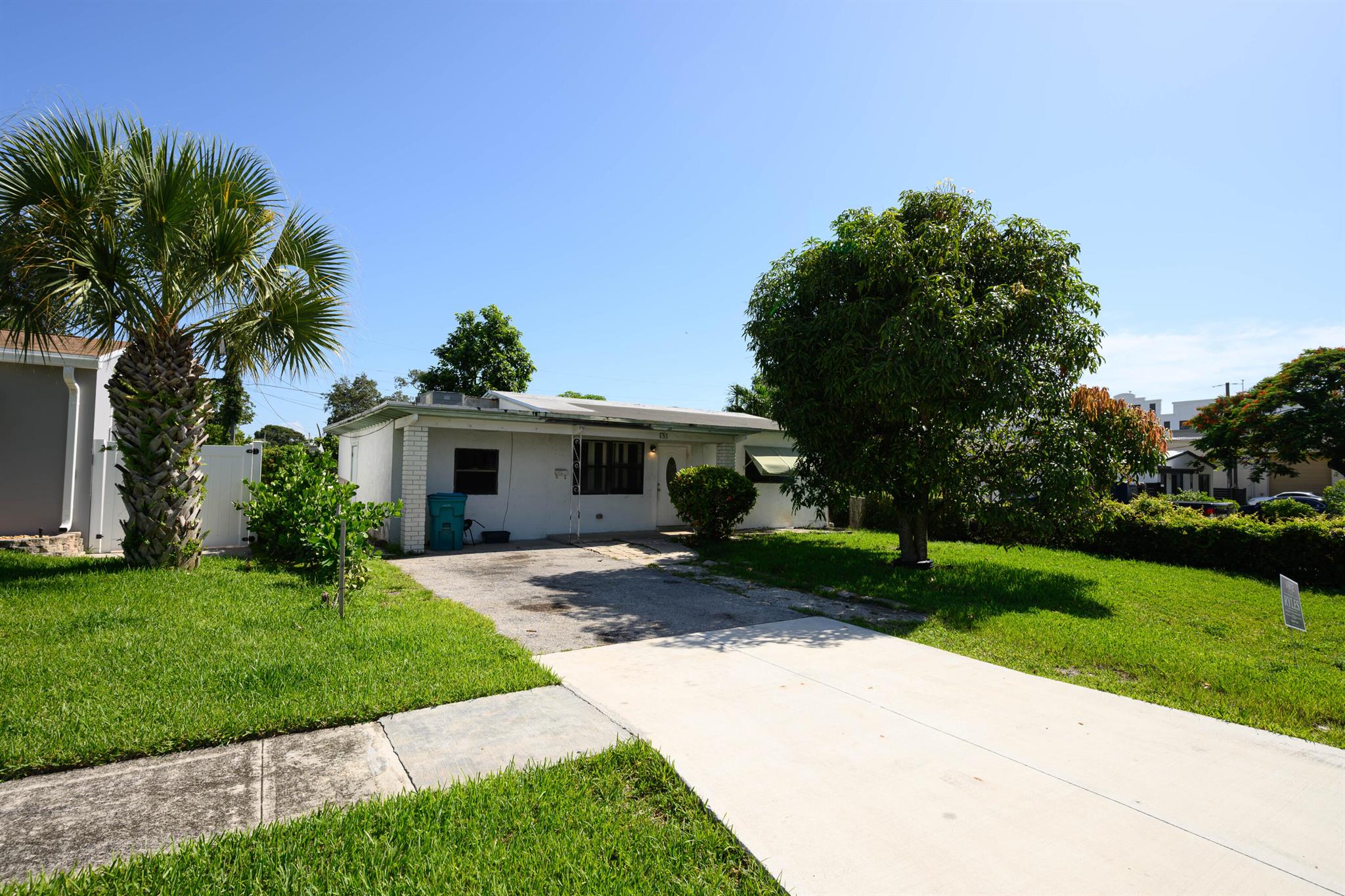 Handyman Special: Fixer-Upper with Endless Potential! Calling all investors, DIY'ers and visionaries! This promising property is located 1 mile to the beach and in short distance to shops, restaturants and nightlife. NO HOA! Large backyard with Fruit Trees (banana, avocado, mango). This house is bursting with potential and just waiting for the right owner to bring it back to life. Being sold AS IS: Please note: Leaking Roof: Needs repair but provides an excellent chance to install modern roofing materials.Inoperable A/C: An opportunity to upgrade to a high-efficiency system tailored to your needs.Complete Renovation Needed: A blank canvas to create the home of your dreams or a lucrative investment property.