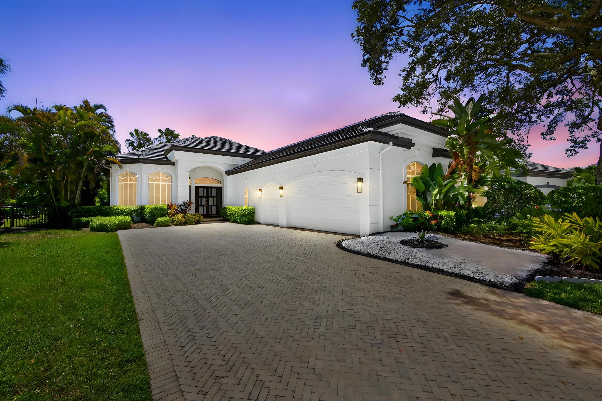 Set on a private cul-de-sac in the boutique Ironhorse community, this updated 4-bedroom, 4-bath ranch styled home offers panoramic views of the preserve, & the renowned Arthur Hills Championship golf course, with no mandatory membership. Be captivated by the 12-ft ceilings with abundant natural light, elegant new porcelain tile floors throughout, a brand-new roof (2024), new A/C, new pool heater, new water heater, new pool pump, new impact double front door, extended driveway & fresh interior & exterior paint.The open-concept kitchen with quartz countertops, a built-in breakfast nook, & a shiplap-accented island, flowing into spacious living areas framed by custom wood panel media wall & sweeping golf views, while the primary suite boasts custom his & hers closets & a spa-style bath.
