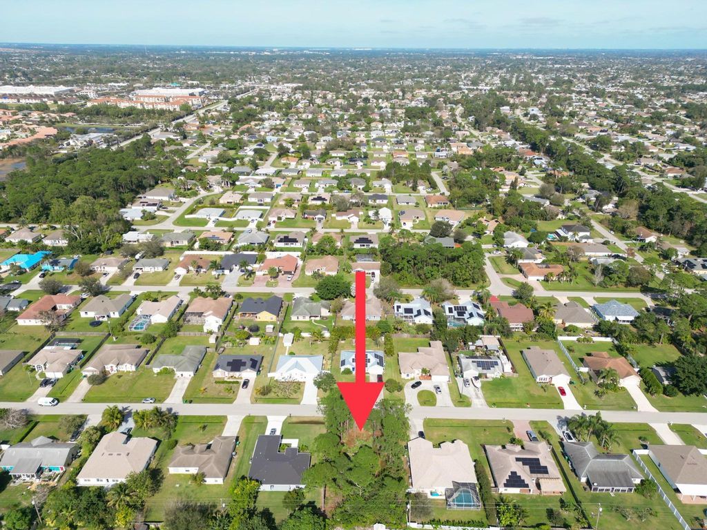 Photo of 1574 SW Meridian Avenue, Port Saint Lucie, FL 34953 (MLS # R10953656)