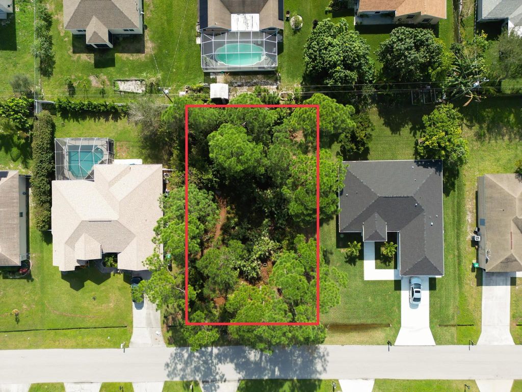 Photo of 1574 SW Meridian Avenue, Port Saint Lucie, FL 34953 (MLS # R10953656)