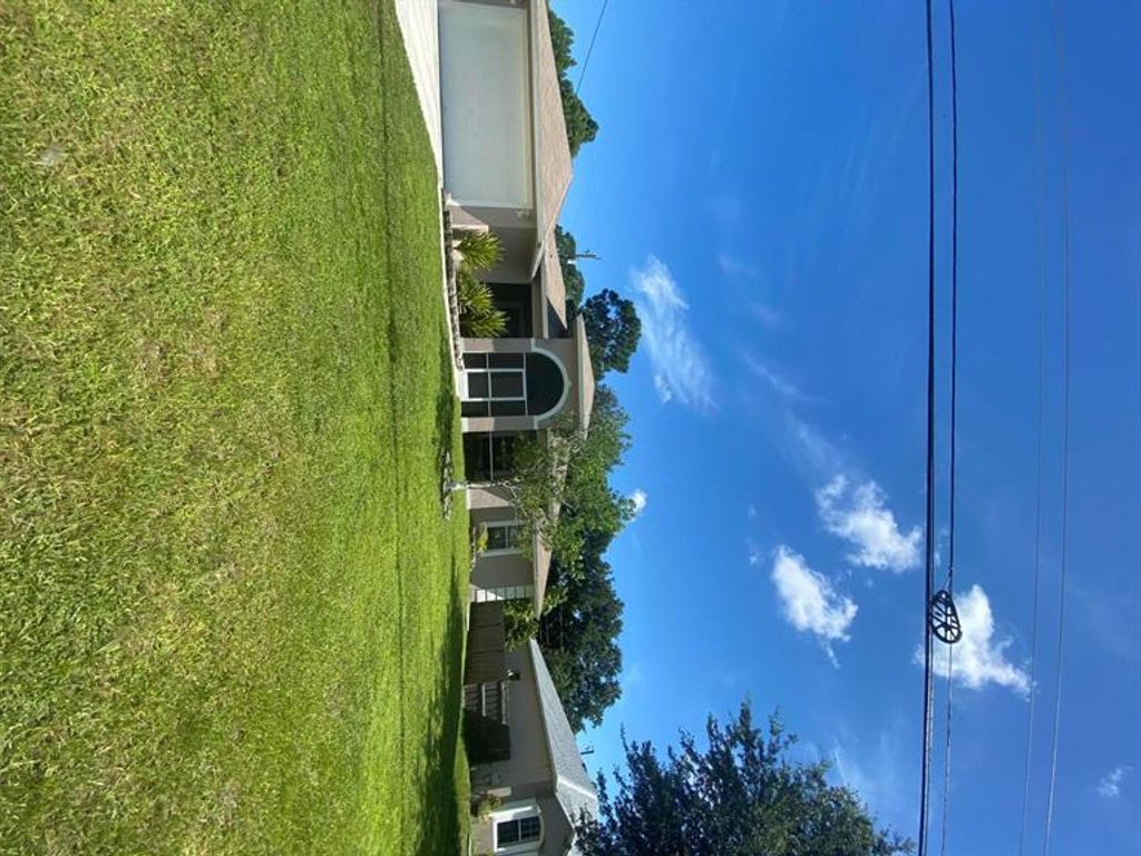 Photo of 517 SW Paar Drive, Port Saint Lucie, FL 34953 (MLS # R10740085)