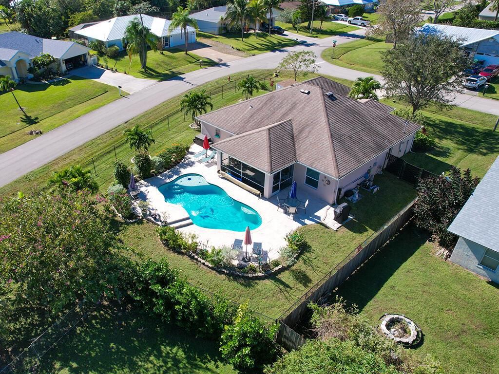 Photo of 2097 SE Parrot Street, Port Saint Lucie, FL 34952 (MLS # R10944349)