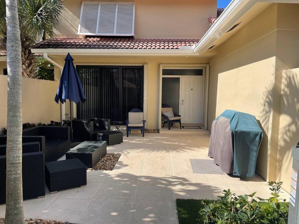 Photo of 102 Old Meadow Way, Palm Beach Gardens, FL 33418 (MLS # R10783578)