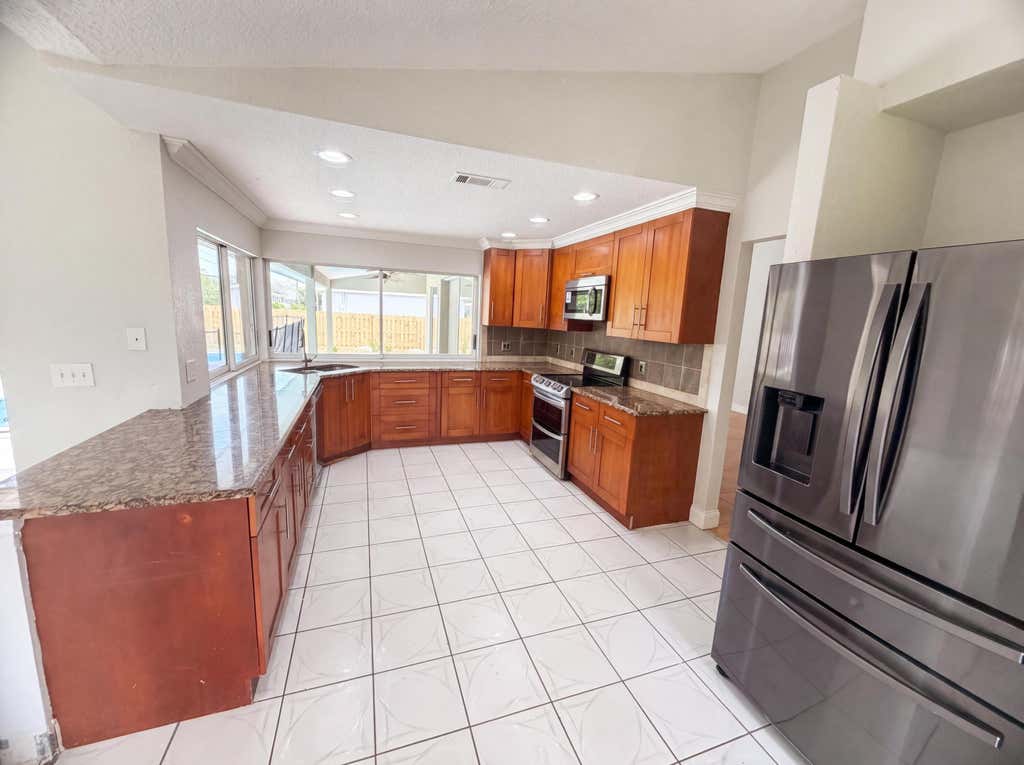Photo of 711 SE Celtic Avenue, Port Saint Lucie, FL 34983 (MLS # B26049807)