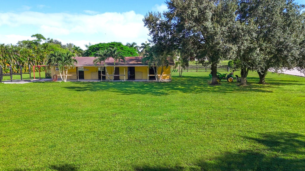 Photo of 16693 Deer Path Lane, Wellington, FL 33470 (MLS # B26082575)