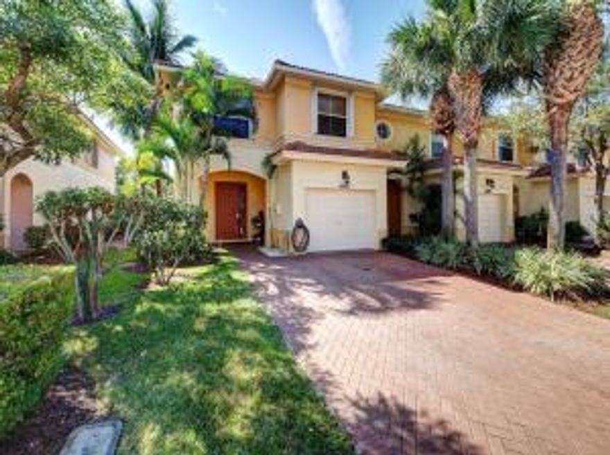 Beautiful 3 bedroom 2.5 bathroom townhouse located in Seminole Gardens at Woodbine. End unit offers extra windows, accordian hurricane shutters, private fenced paver patio. First floor has ceramic tile floor. Stairs and second floor are carpeted. Second floor laundry room and master suite. One car garage.