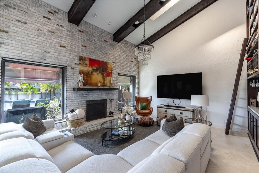 This Tastefully Furnished Townhome in the Lakes of Deer Creek is located on 35feet of Lake Front and features an Incredible Back yard Oasis, Heated Private Pool and Great Entertainment Patio! This property features 3 Bedrooms & 3 Full baths, 1 car Garage, 2 New A/C units, Eat in Chef's Kitchen, Granite tops, Laundry Room, Real Fireplace, skylights, All impact windows & French Doors, Marble Floors & Bamboo upstairs, Master Bath has Sauna w/music system,  Serene Lake Views from your large private Balcony, New roof  in process,  Large walk-in Closets,  Both Bedrooms upstairs are masters & have showers only. Deer Creek Country Club is a beautiful Golf Course Open to the public! No membership required Come home to this Tropical Oasis just minutes to Magnificent Beaches, Nightlife & Restaurants! Completely Updated