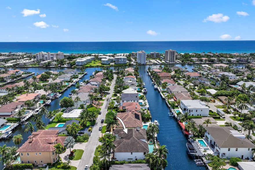 Discover exceptional waterfront living in the prestigious Tropic Isle community of Delray Beach. This 7-bedroom, 7.2-bathroom custom estate spans nearly 7,000sf under air & offers the ultimate in luxury and craftsmanship. Each bedroom features its own en-suite bathroom. Built in 2008 the home is constructed with solid concrete pilings and hurricane-impact glass throughout.
Inside, soaring ceilings, marble & granite finishes, and expansive water views create an elegant yet inviting atmosphere. A high-tech movie theater and elevator up to the 3rd floor bonus room adds modern convenience, while the open-concept layout includes a first-floor guest suite, gas fireplace for effortless entertaining.
Outside, enjoy 90 feet of seawall, a 70-foot dock with deep-water access and no fixed bridges A custom-designed pool, and a fully equipped summer kitchen, all perfectly positioned for all-day sun with ideal southern exposure.

Located between the Boca Raton and Boynton Beach inlets and just minutes from Atlantic Avenue, this estate offers an unbeatable blend of size, location, and waterfront lifestyle.