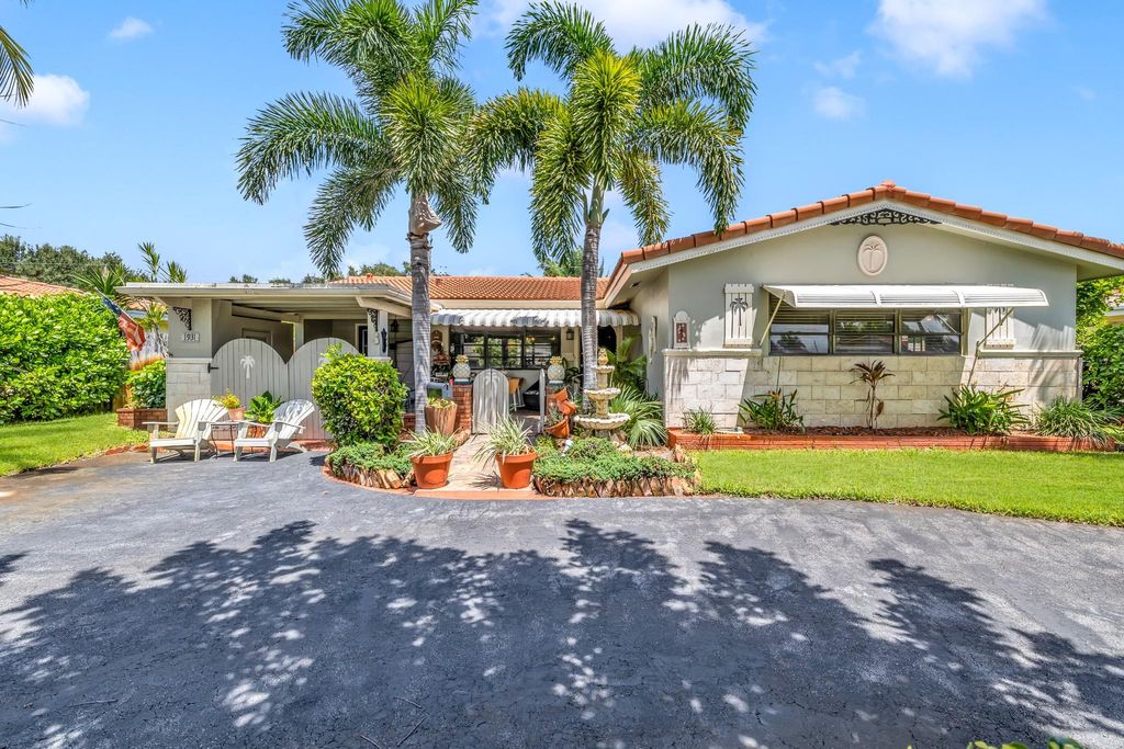 Photo of 1931 NE 27th St, Lighthouse Point, FL 33064 (MLS # F10524427)