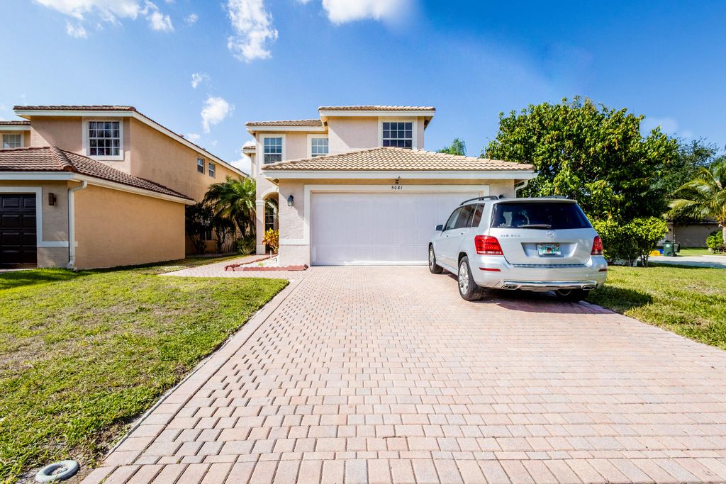 Photo of 5081 Saturn Ring Court, Greenacres, FL 33463 (MLS # R11081077)