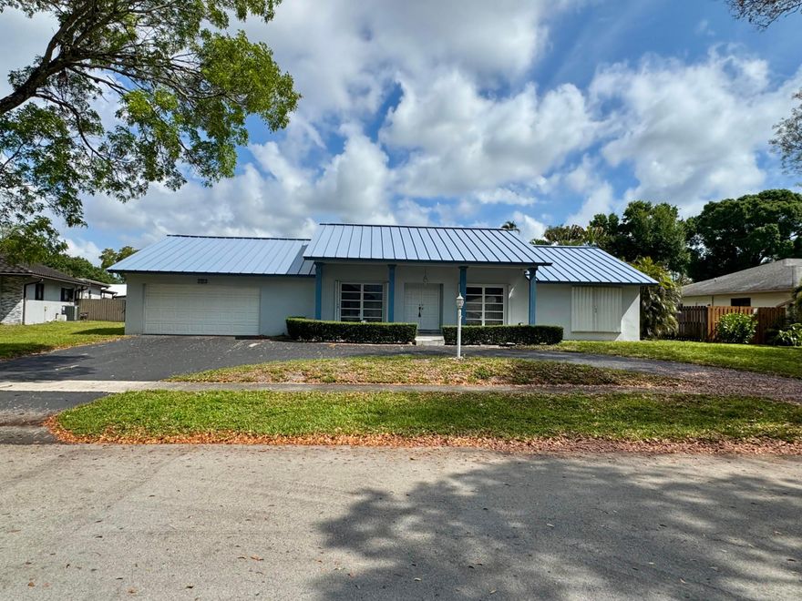 What a great 4 bedroom 2 1/2 bath house with a 2 car garage. The 5th bedroom is either a bedroom, office or playroom for the kids. Large rooms with large closets. Primary bedroom with walk in closets and others as well. Family room, dining room, living room, eat in kitchen and a super large laundry room.  Large domed screened in patio with private pool. 2 cabana baths. House to be freshly painted and new vinyl luxury flooring ordered. Nice quiet neighborhood. Circular driveway large enough for 8 cars. Close to the highways, Fort Lauderdale Airport, Dining, Shopping, Restaurant, Schools and a whole lot more.