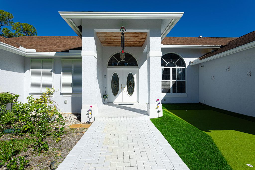 Photo of 8895 Palomino Drive, Lake Worth, FL 33467 (MLS # R11160060)