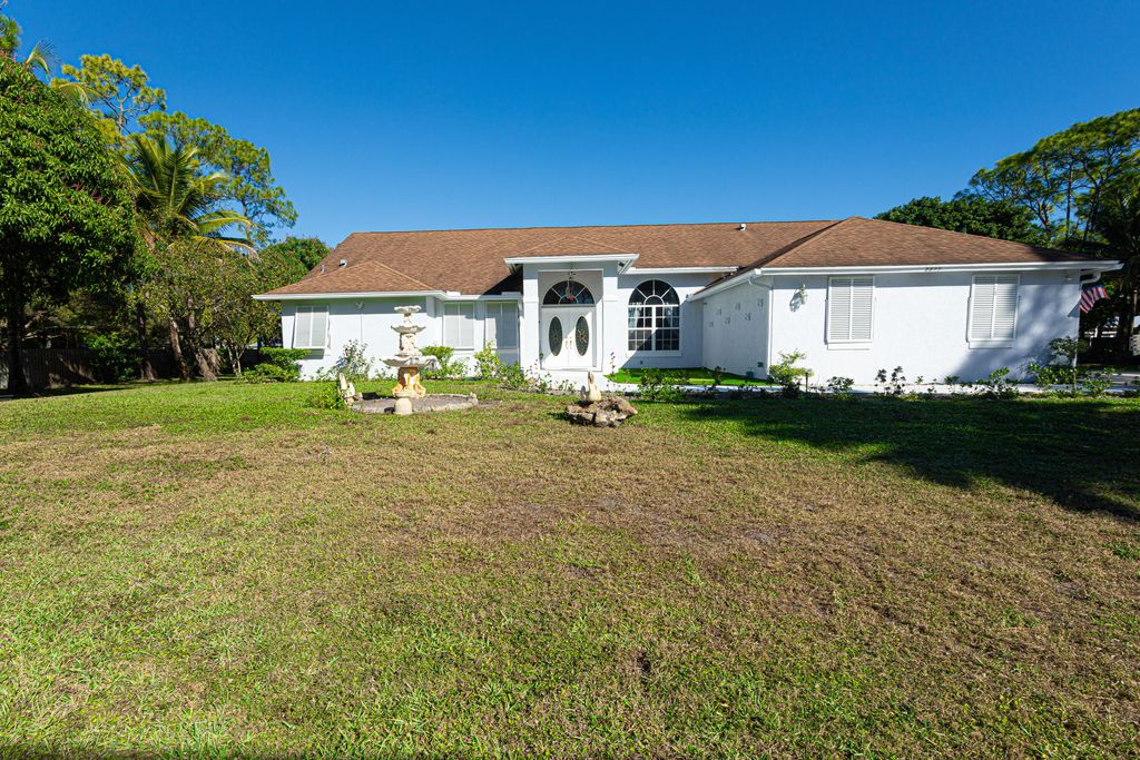 Photo of 8895 Palomino Drive, Lake Worth, FL 33467 (MLS # R11160060)