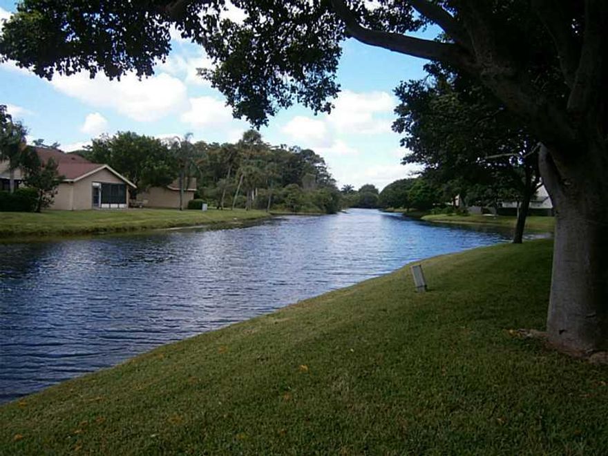 A RARE FIND*3 BEDROOM 2.5 BATH LAKE FRONT TOWNHOME*NEW KITCHEN W/ EASY CLOSE DOORS & DRAWERS*GRANITE COUNTERS, GLASS TILE BACK SPLASH  & STAINLESS STEEL APPLIANCES INCLUDING 4 DOOR FRIDGE*CEILING POPCORN REMOVED*REMODELED MASTER BATH & DOWNSTAIRS HALF BAT H*NEW TILE FLOORS*HIGH HAT LIGHTS*NEWER AIR CONDITIONER*SPACIOUS ENCLOSED PATIO*FRESH PAINT*4 CEILING FANS*CUSTOM HIGH BASEBOARDS*ACCORDIAN SHUTTERS*QUIET SECLUDED AREA OF THE TOWNSHIP CLOSE TO PARKS & PLAYGROUNDS*EASY WALK TO COMMUNITY POOL*min.10% down