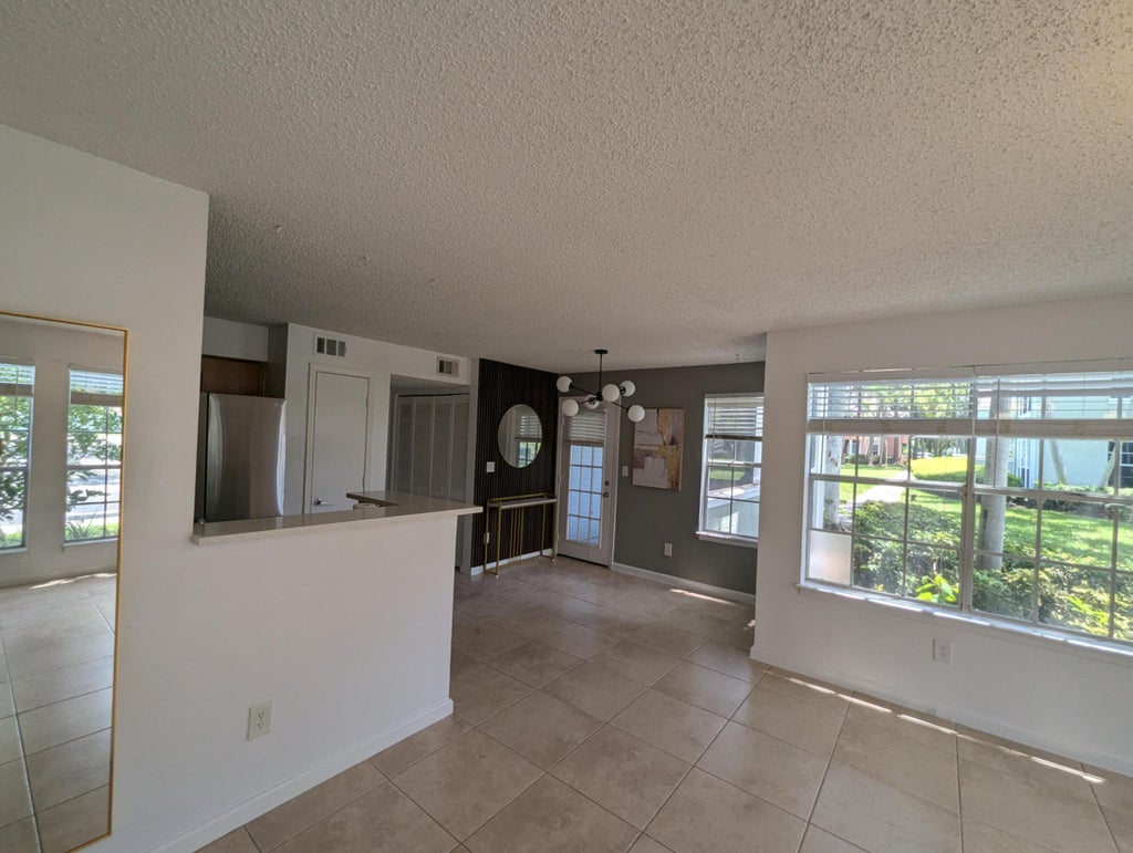 Photo of 1215 CRYSTAL Way #G, Delray Beach, FL 33444 (MLS # B26072456)
