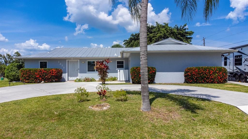 Photo of 1273 SE Preston Lane, Port Saint Lucie, FL 34983 (MLS # R10799091)