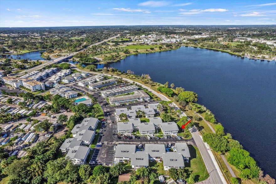 Located along scenic Lake Osborne, one of the largest fresh water lakes in Palm Beach County, this corner unit residence offers tranquil lake views and abundant natural light. Lake Osborne is well known for fishing, boating, kayaking and water skiing, as well as peaceful surroundings and proximity to nearby parks. The building features a new roof installed in 11/25 for added peace of mind. This property offers a relaxed Florida lifestyle while remaining close to shopping, dining, beaches, and major highways.