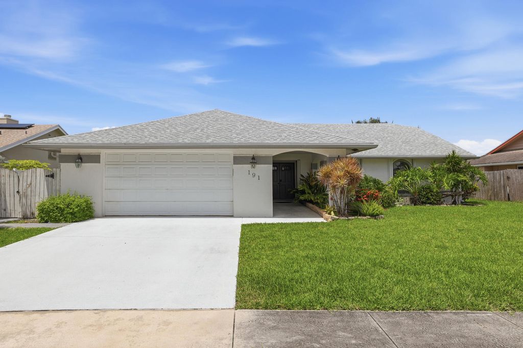 Photo of 191 Parkwood Drive, Royal Palm Beach, FL 33411 (MLS # B26024171)