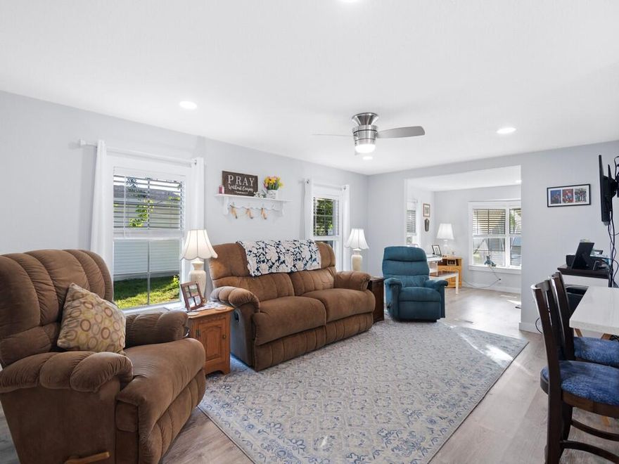 WELCOME HOME to this beautifully REMODELED, WATERFRONT home in the 55+ community of Spanish Lakes Golf Village!  NEW kitchen, floors, appliances, water heater.  This home is MOVE IN READY!  Enjoy the wide water view from your back patio!  This home has 2 bedrooms, 2 bathrooms, and is located at the end of the Cul de sac!  Roof replaced in 2023!  Schedule your private showing today, this home won't last long!