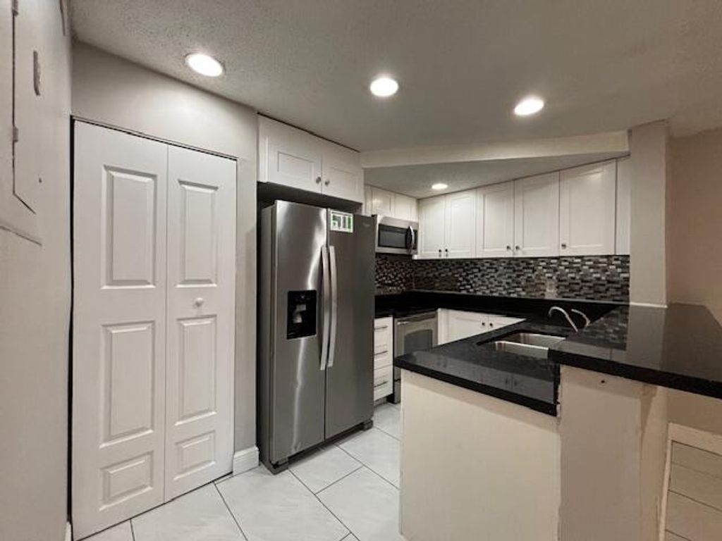 Photo of 5844 Blueberry Unit 68 Court, Lauderhill, FL 33313 (MLS # R11168418)