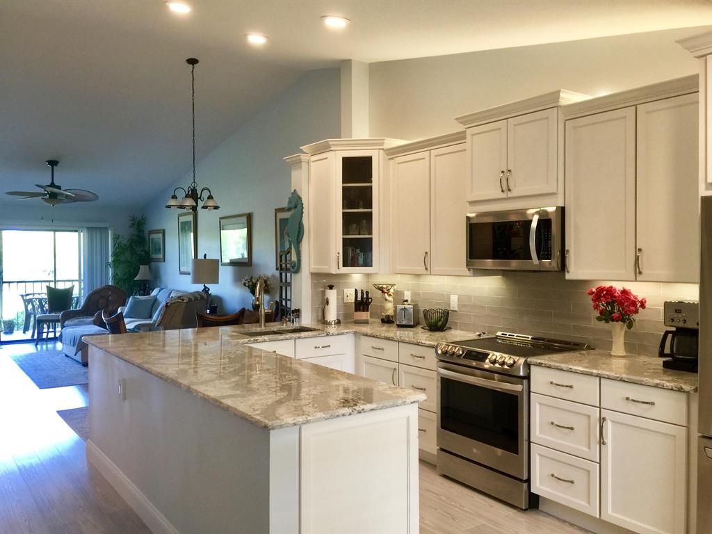 Photo of 1082 Keystone Drive Dr #E, Jupiter, FL 33458 (MLS # R10818431)