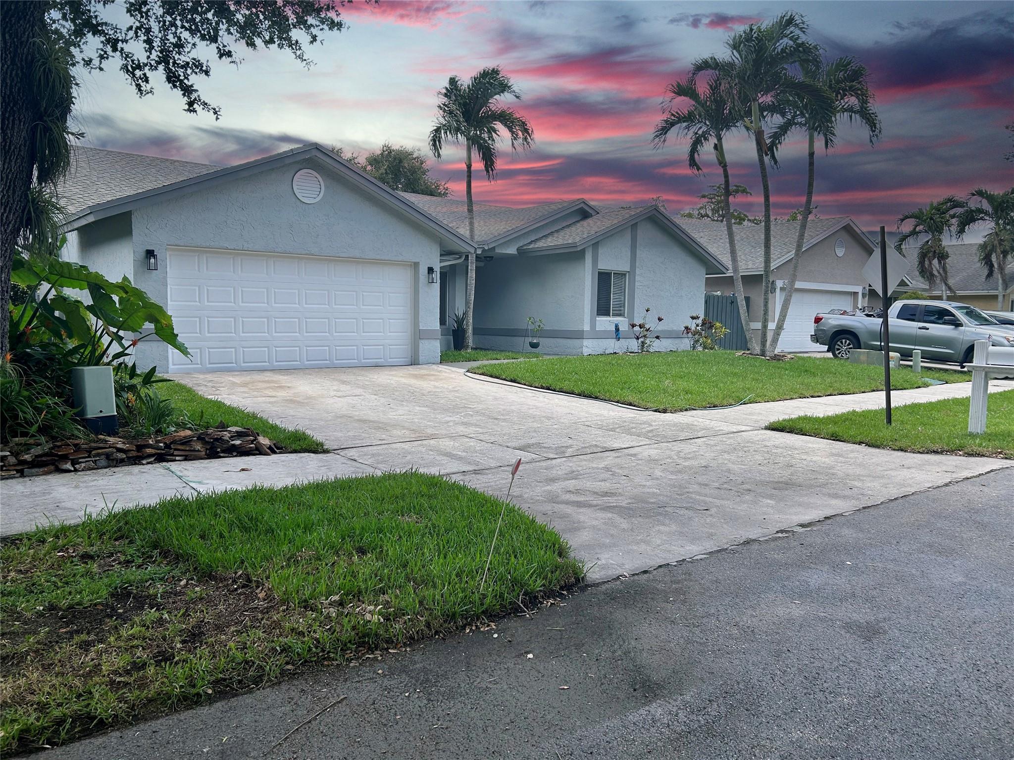 Welcome to this great Pool home!! Facing a Preserve area with no neighbors plus extra parking for your guest! a 15K redo pool with new diamond bright & LED pool light, new pump. Central location and high rated schools. Modern Porcelain tiles in the front yard & patio plus a new screen. Open floor plan, with generous family room area. Split model floor plan with spacious bedrooms, nice size closets with new closet doors and california closet wall unit. Master bath has new dual sinks, new water valves on all sinks, new master toilet, and new tile. Light tan carpet. 8”x48” vinyl planks with 6” baseboard. New sod grass & new paint inside & out, new light fixtures outside. New AC is being installed, new refrigarator, stove and dishwasher. Easy access to The Sawgrass Express way & The Turnpike