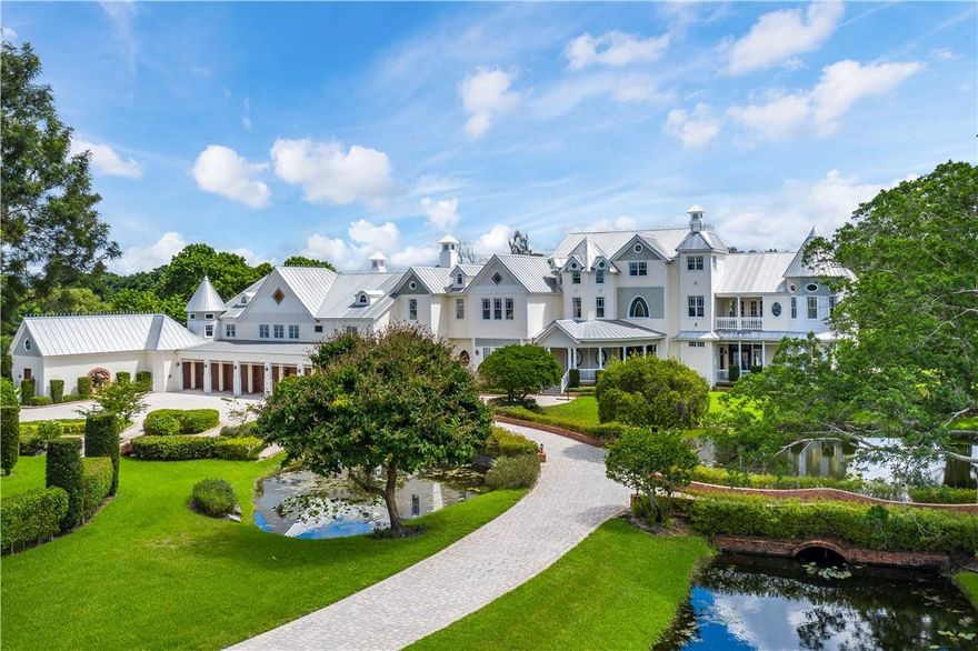 Sunshine Ranches storybook estate is set across 7.2 manicured acres. The spectacular 16,000SF+, 9BR/11fullBA/4halfBA compound represents classic style in every way with sprawling, long winding entrance, gardens, scenic ponds and more. The warm welcome doesn't disappoint with natural light abound, stained glass windows, grand ballroom, two-story gentleman's bar, movie theater, 2-lane bowling alley, dance studio ... the list goes on an on. Outside, take a casual stroll, enjoying everything in the privacy and comfort of your own confines. Walkways, lush foliage and mature trees outline private lighted tennis court, 80x44 freeform resort-style pool and rolling lawns. Private entrance and 5-car garage provide ample security for all the toys and car collection. Simply stunning. Show and sell.