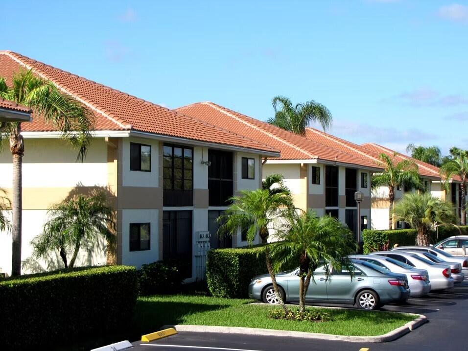 Photo of 15217 LAKES OF DELRAY Boulevard #107, Delray Beach, FL 33484 (MLS # B26083180)