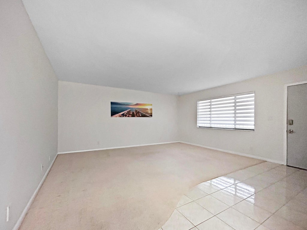 Photo of 15217 LAKES OF DELRAY Boulevard #107, Delray Beach, FL 33484 (MLS # B26083180)