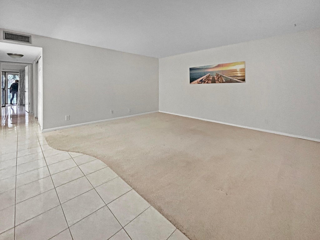Photo of 15217 LAKES OF DELRAY Boulevard #107, Delray Beach, FL 33484 (MLS # B26083180)