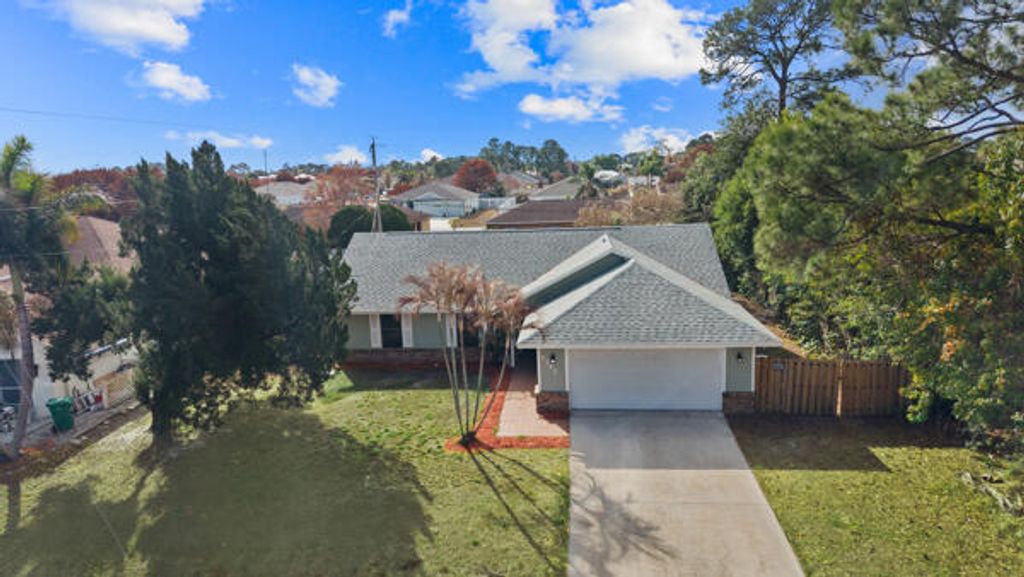 Photo of 1342 SW Ingrassina Avenue, Port Saint Lucie, FL 34953 (MLS # R11165969)