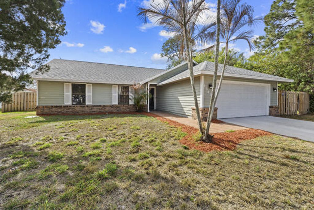 Photo of 1342 SW Ingrassina Avenue, Port Saint Lucie, FL 34953 (MLS # R11165969)